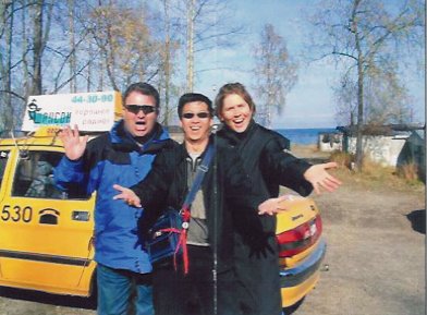 Tony with video producer Kate and another member of the team at Lake Baikal. Vikor's Russian taxi is in the background