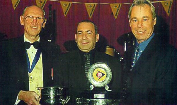 Dunlop's David Sergeant and TD Of Y Committee member Bill Tyzack (C6) present Howard Kott (B74) with the winner's trophy