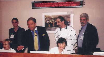 Brian Rice shows the two Greek visitors and Helen Garrett of Microbus how the call centre at DaC operates