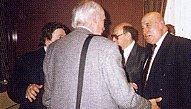 Photo taken at the launch of SPLT at the Barbican Hotel. Back to camera, the late Ernie Keates talking to Doug Sherry. On the left is Radio Taxis Chairman Geoffrey Riesel.