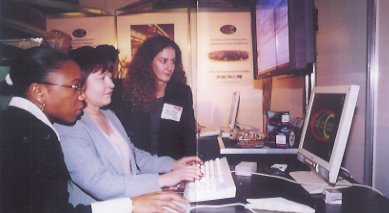 Philipa Whiting from Blick Rothenberg watches while DaC's Pam Campbell (centre) and Sandra Peters (left) show how it's done