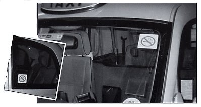 Passengers can see a 'no smoking' cab before they enter. Inset pic: Sign seen in passenger compartment acts as a reminder