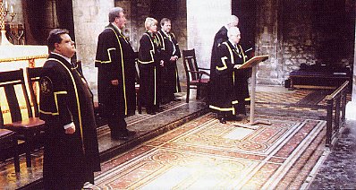 The investiture is now well underway with Past Master Dave Allen, Alan Parker, Patricia Satnley, John Beesley, Beadle John Sheen and Master John Rennie waiting on the platform.