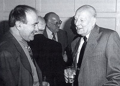 Martin Gellman (I) talking to another former Chairman, Jack Russell in 2000. A third ex Chairman, Aubrey Siteman is in the background. 