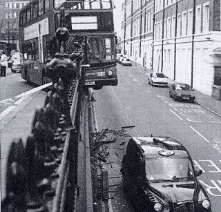 The bus perches perilously close to Phil's Cab