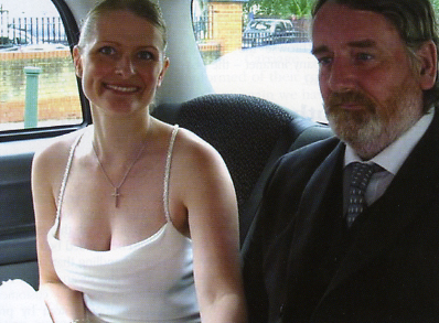A radiant Aoife and her father on their way to church in Ronnie's Cab