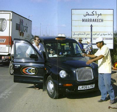 "You can't park 'ere mate.  It's for minnicamels only!  Mark arrives in Marrakesh...