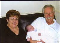 Sandra and David with latest grand-child Sadie