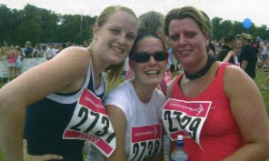 Lisa (far right) and two friends after finishing the race