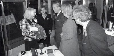 Museum curator Jennifer Marin shows the Royal couple a fine example of a silver Hanukkah lamp.  Photo courtesy The Jewish Museum