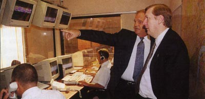 Brian Rice shows Jamie around Brunswick House in 2001 when Jamie was still MBH Chairman