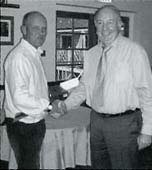 DaC's Howard pears collects the prize for DaC driver Duncan Hope who had to leave early