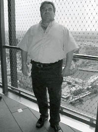 Tony in pensive mood following the first seminar, stands on top of Melbourne's tallest building the Eureka Tower