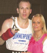 Rob with wife Tina and his trophy after the match