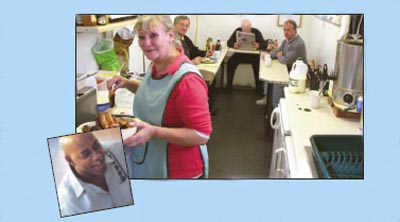 Pat Carter in the kitchen of her Warwick Avenue shelter.  DaC driver Martin Freeborn (C67) in the background is one of many DaC drivers that use the shelter.  Inset pic: Ainsley Harriott