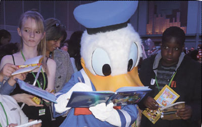 Donald Duck signs autographs for the kids!