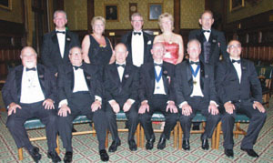 The LTFUC committee pose in the Members Dining Room