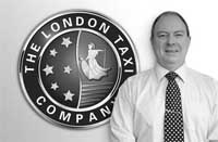 Patrick Plant with the new London Taxi company logo