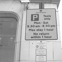 The top sign says 1 hour max. The bottom one says 20 mins max at 1 per hour! Other signs confuse credit card payments...