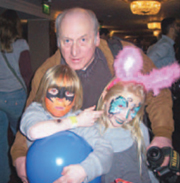Tom Whitbread with two young children from Northern Ireland