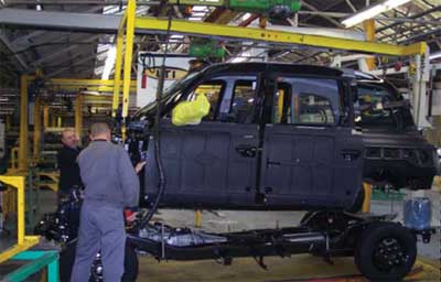 A TX4 body drops onto the chassis