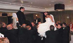 A happy Ilona and Tom Duce at their wedding