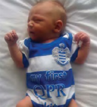 Charlie takes a nap before the big match in his QPR outfit!