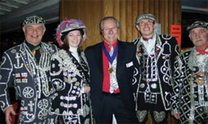 DaC's David LEssman, the Fund's Chairman, with the Pearly kings and queens