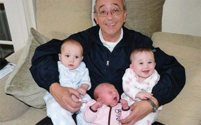 1 week old Ava hangs on between the 6 month old twins, Ethan and Emily