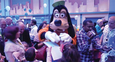 Goofy is kept busy signing autographs!