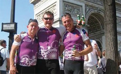 John and friends arrive at the Arc de Triomphe