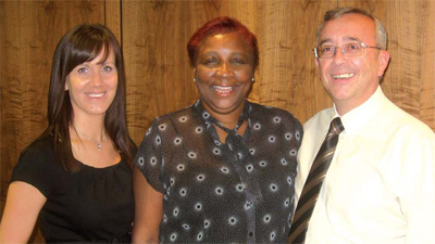 Joyce with team leader Emma and Keith Cain at her retirement party