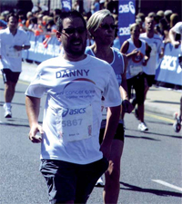 Danny approaches the Cenotaph at the end of his 10k run in memory of his mum, Carole