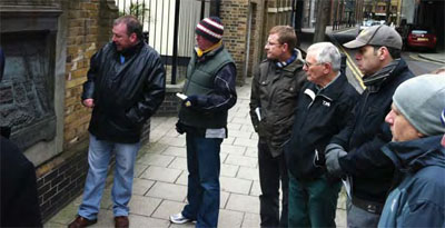 Kevin Malloy takes a group around historic Southwark