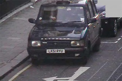 Westminster photo of Gerry waiting on a single yellow line while his passenger went into the chemist