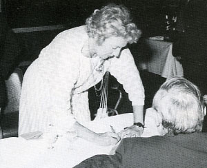 Dame Vera Lynn as always shows her willingness to go among the "old soldiers" and their helpers, giving her autograph and kind words wherever needed