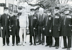 Barking meets Chelsea. The civilians posing with the Pensioners are from the Barking Royal British Legion Club and who made a very large contribution to the War Disabled cab fund